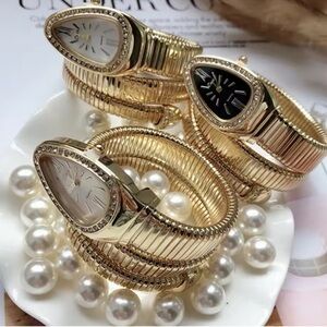Serpenti-Inspired Gold Coil Wrap Watch – Black Face with Crystal Bezel